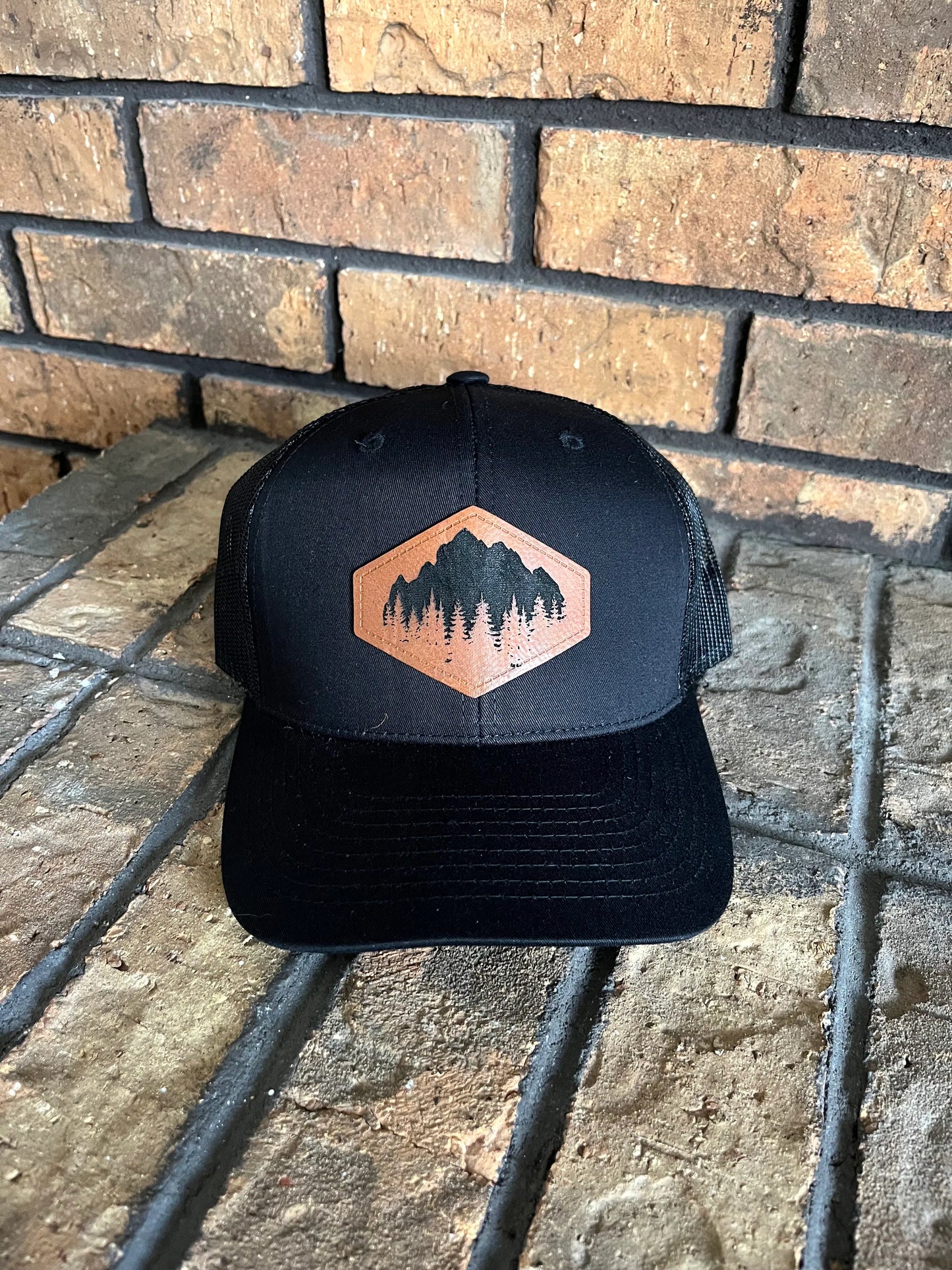 Trucker Hat with Engraved Leather Patch - Mountains